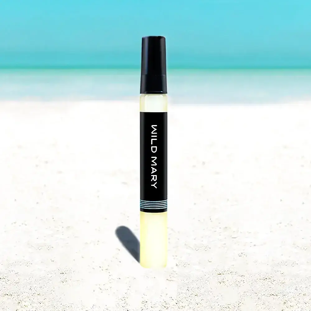Wild Mary Rosemary Mint Elixir 10 ml Mini Sprayer on Holbox Beach
