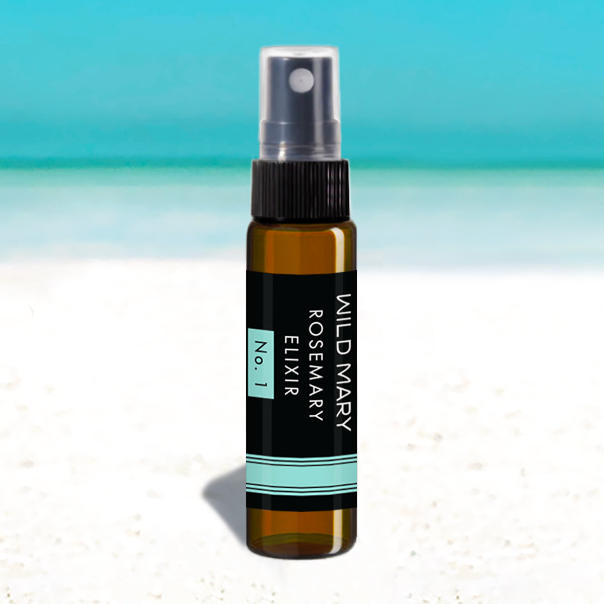 Wild Mary Mini Rosemary Elixir No. 1 Rosemary Milky Essence Toner in a black glass spray bottle on Holbox Island beach