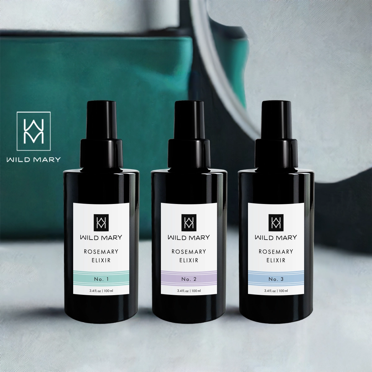 Wild Mary Rosemary Elixir Trio featuring No. 1 Rosemary, No. 2 Lavender, and No. 3 Rosemary Mint Milky Essence Toners on a vanity.
